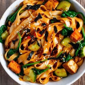 Option 2 -  Cold rice noodles tossed with gochujang smothered smashed cucumbers, edamame and Korean sesame spinach and bok choy.